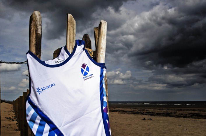 The white KUKRI Scotland vest for Glasgow 2014 flutters on St Andrews beach