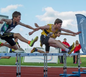 Hurdling action by young athletes at the Age Groups in Aberdeen in 2013