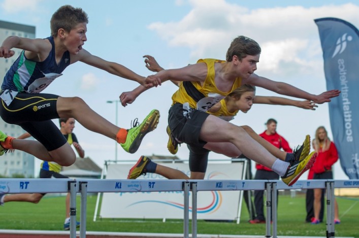 Hurdling action by young athletes at the Age Groups in Aberdeen in 2013