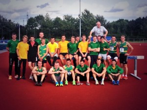 Glasgow athletes in yellow and green celebrate promotion