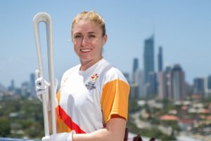 GC2081 ambassadsor Sally Pearson OAM with Queen's Baton