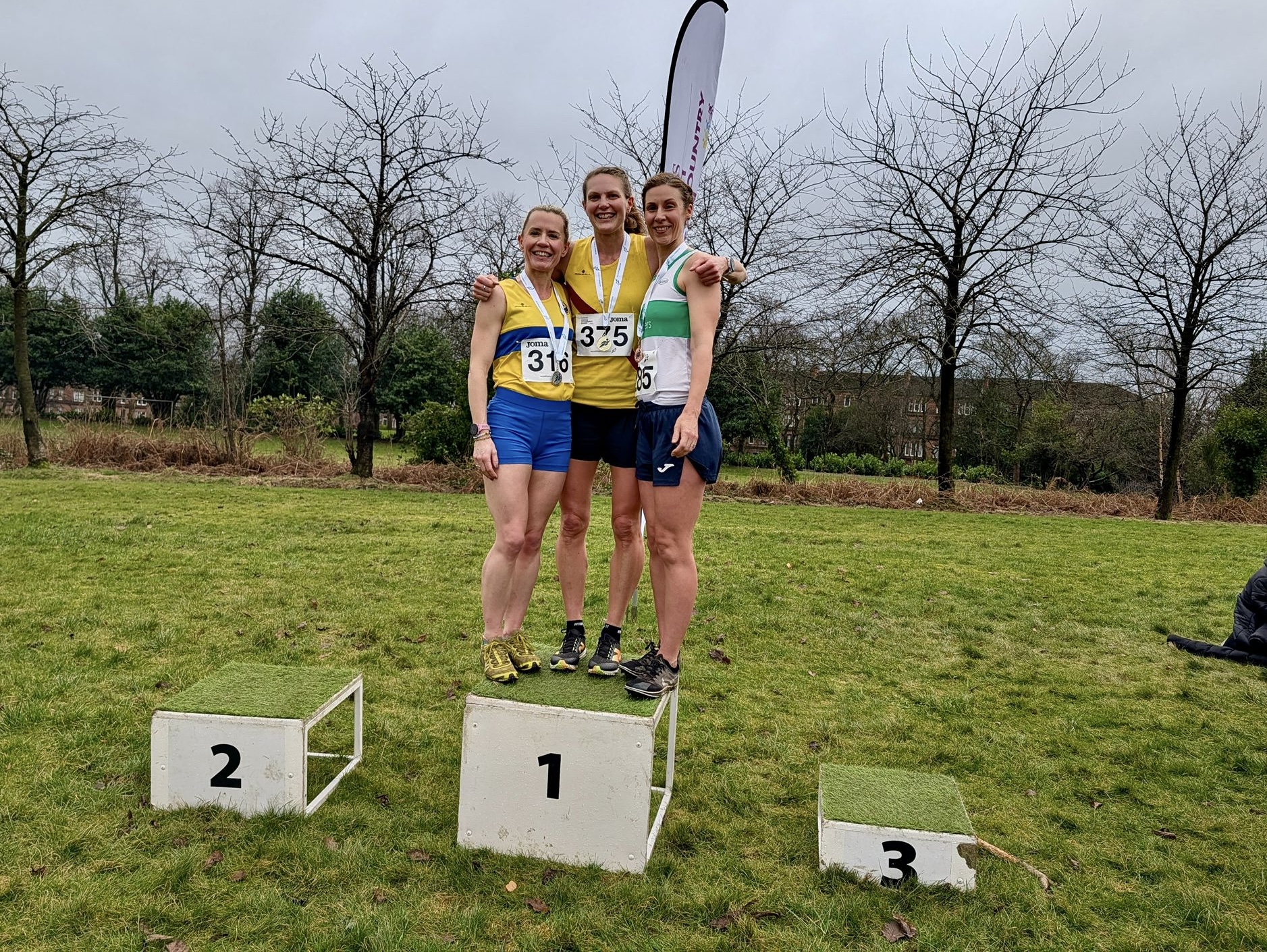 Medal moments at Lindsays Masters XC in mud at Tollcross Park